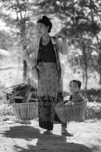Woman Carrying Baskets With Child And Woods 3423917